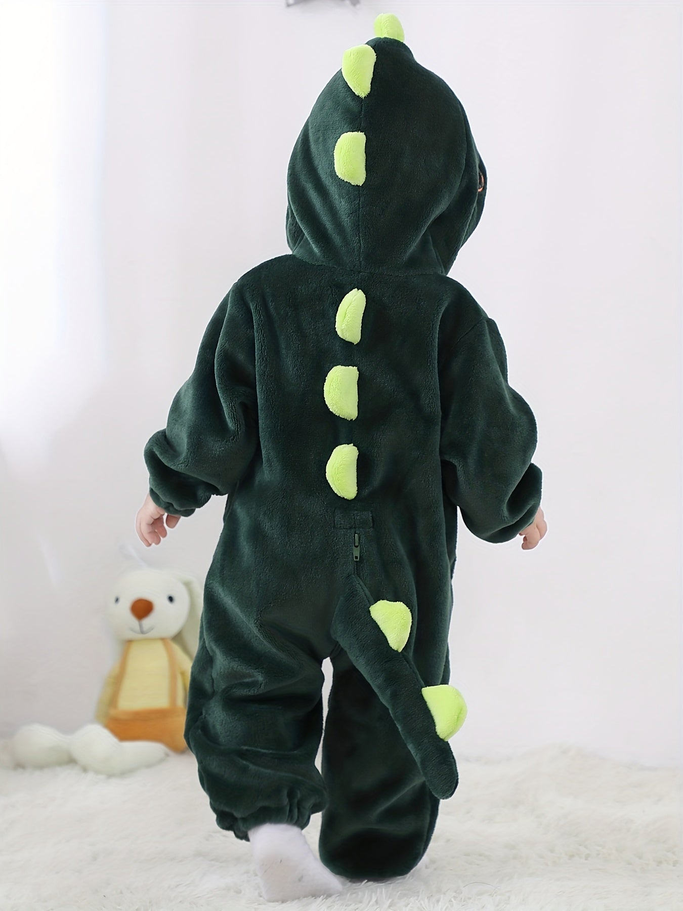 Macacão infantil fofo com capuz e mangas compridas, estampa de dinossauro de desenho animado. Ideal para festas e uso casual ao ar livre na primavera, outono e inverno.