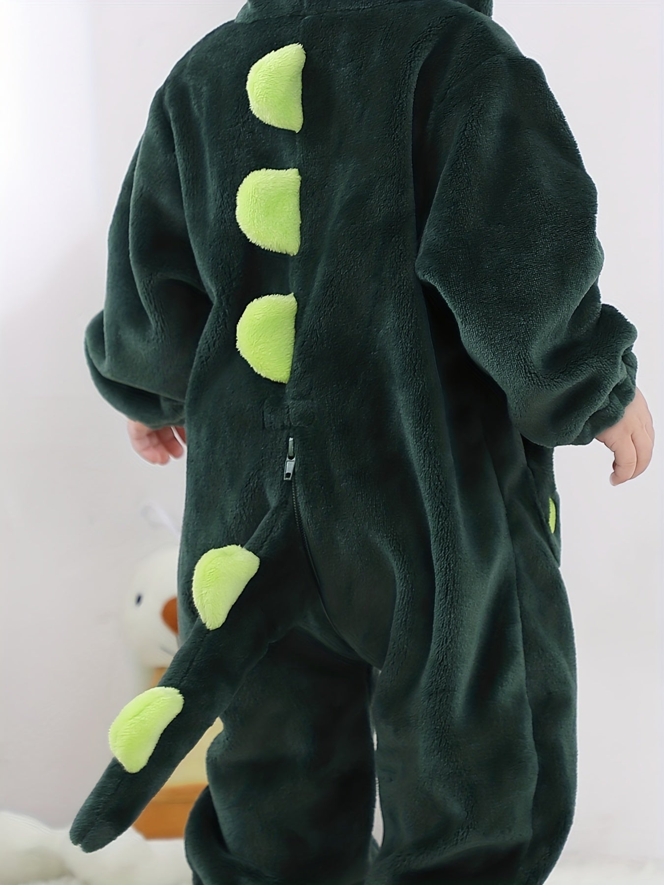 Macacão infantil fofo com capuz e mangas compridas, estampa de dinossauro de desenho animado. Ideal para festas e uso casual ao ar livre na primavera, outono e inverno.
