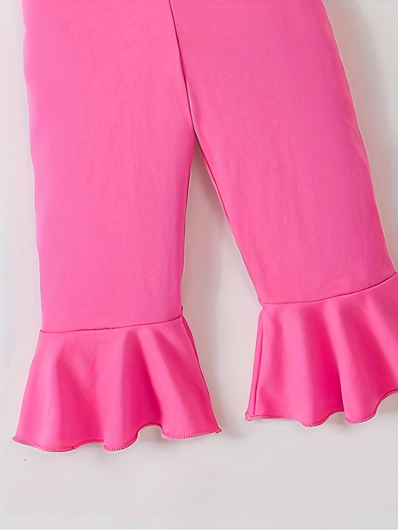 Macacão infantil feminino estiloso com decote halter e pernas largas